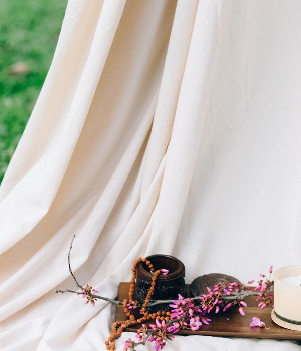 Person in a fluid yoga pose in a minimalist black and lime green setting.